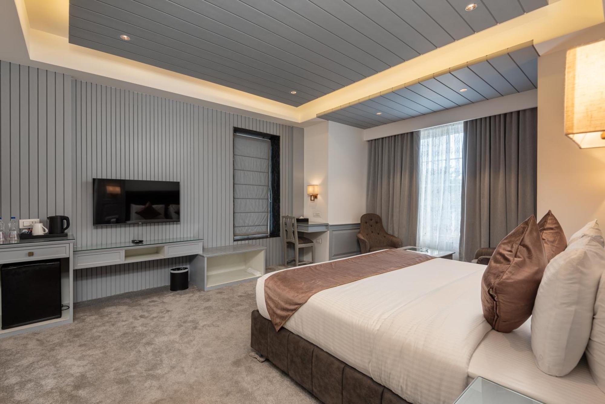 Hotel Grand Boulevard Durgjan Quarto foto