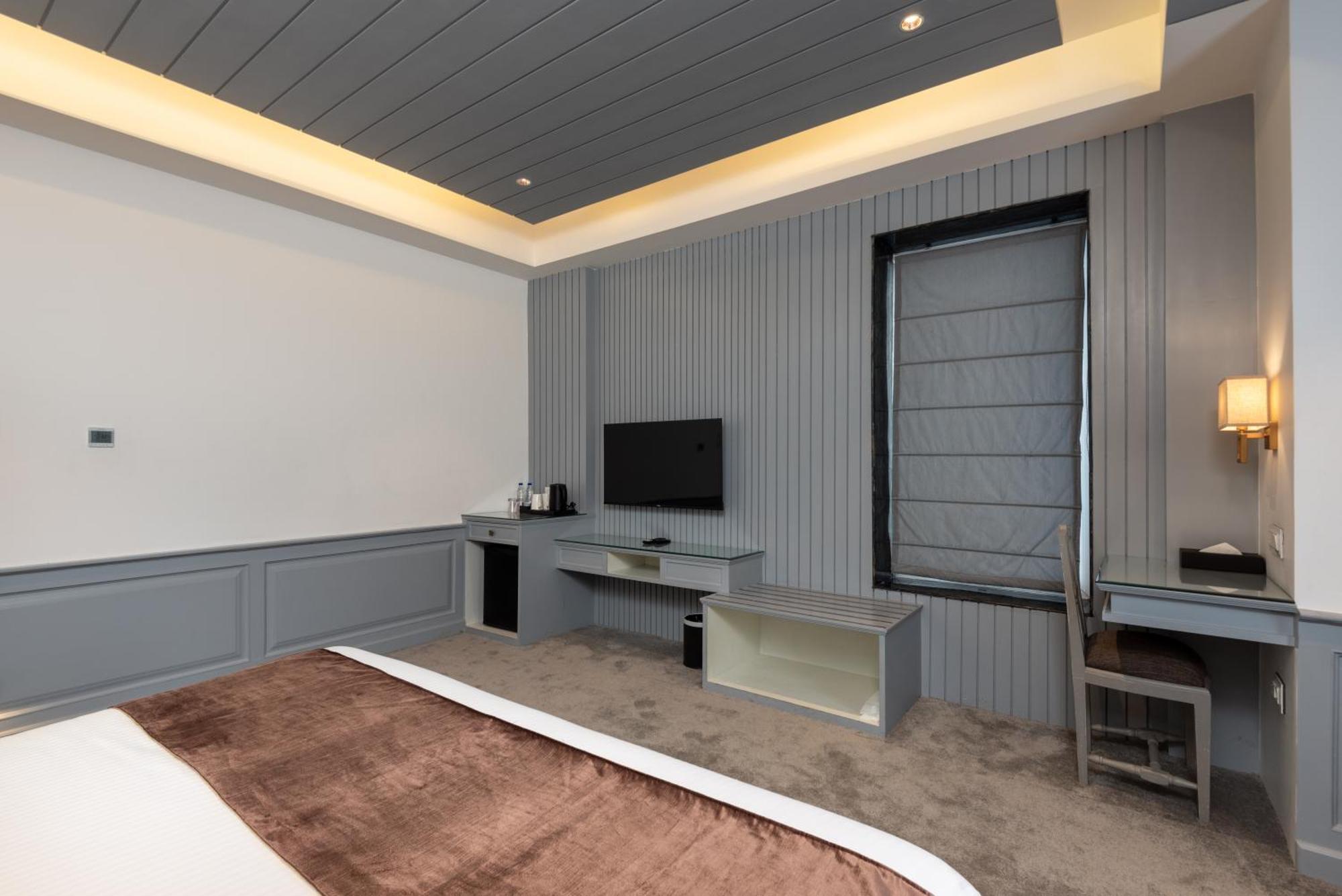 Hotel Grand Boulevard Durgjan Quarto foto