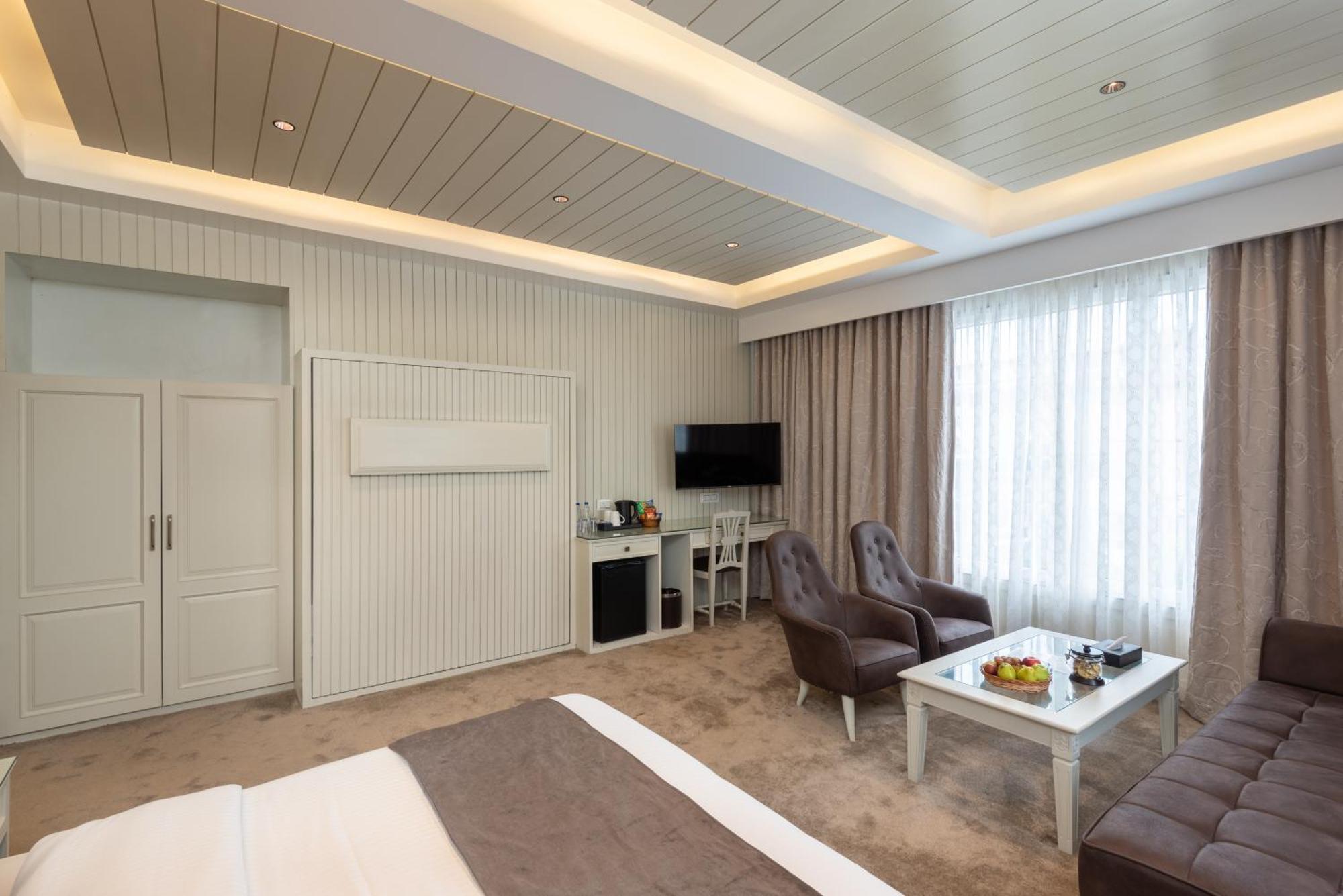 Hotel Grand Boulevard Durgjan Quarto foto