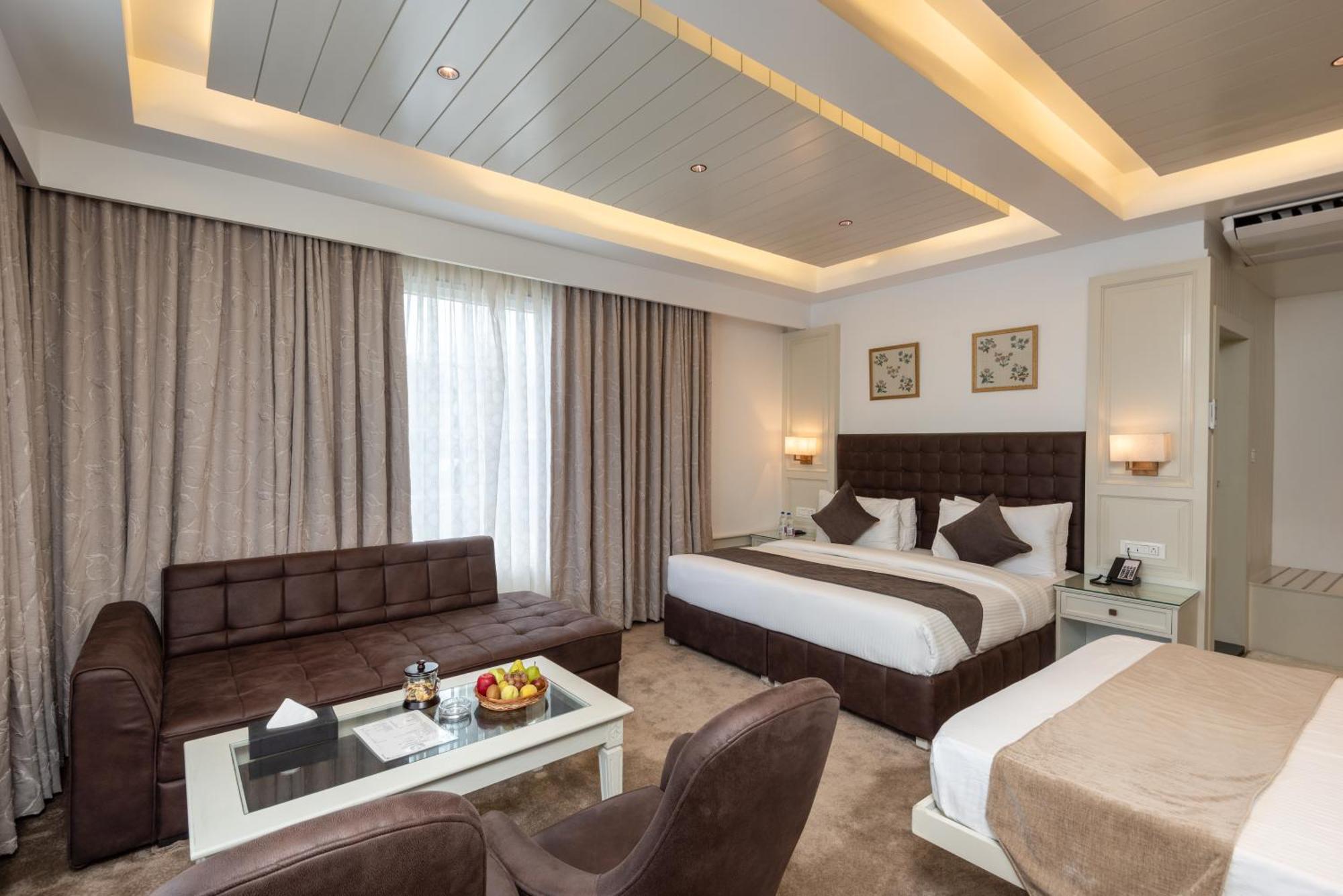 Hotel Grand Boulevard Durgjan Quarto foto
